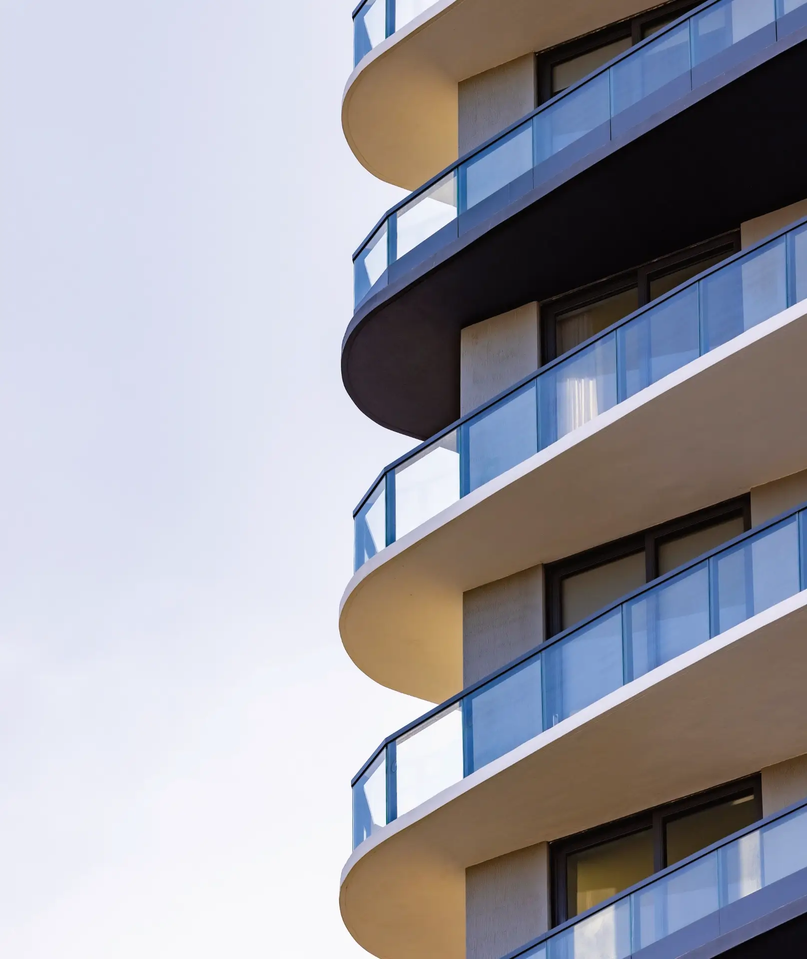 Close up view of the Mondrian Hallandale Beach Residences exterior with a focus on the residents private balconies.